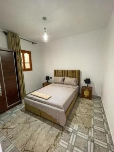 Postel nebo postele na pokoji v ubytování aura dreams appartement 1