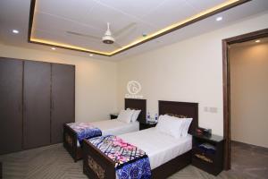 Φωτογραφία από το άλμπουμ του Multazam Heights, DHA Phase 8, Hotel Airport Lahore στη Λαχόρη +7 φωτογραφίες