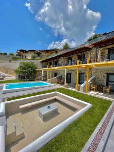 The swimming pool at or close to Koumaros Aparthotel