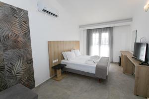 Postel nebo postele na pokoji v ubytování Hotel Philoxenia + 37 fotografií