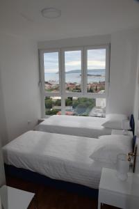 Postel nebo postele na pokoji v ubytování Panorama