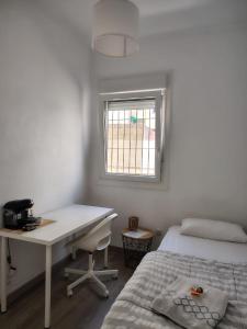 Postel nebo postele na pokoji v ubytování Agui House