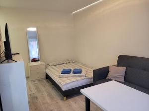 Postel nebo postele na pokoji v ubytování Уютная студия Pähklimäe 11