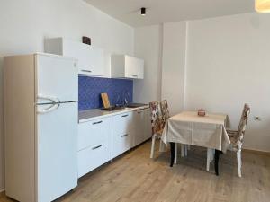 Kuchyň nebo kuchyňský kout v ubytování Rumar Hotel