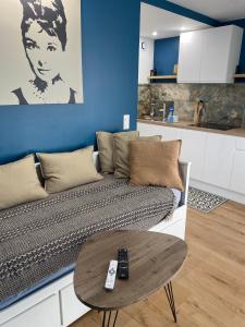 Posezení v ubytování Appartement cosy avec piscine