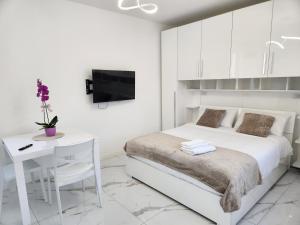 Postel nebo postele na pokoji v ubytování Residence JASMIN 2P