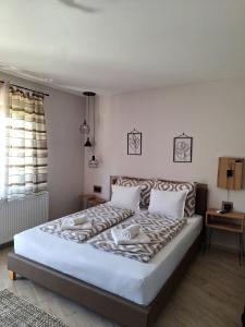 Posteľ alebo postele v izbe v ubytovaní Guest House Dimitrije