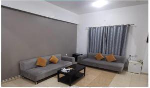 Зона вітальні в Almultaqa Hotel فندق الملتقى