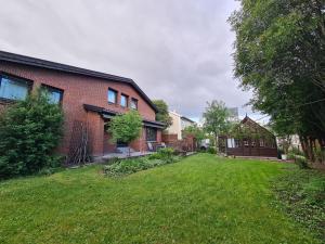 En hage utenfor DT Serene Villa - Lillestrøm