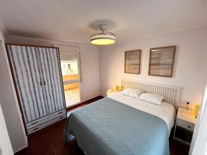 Postel nebo postele na pokoji v ubytování Relax rooftop in the palm trees