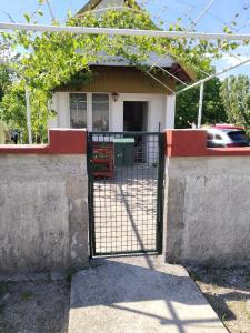 a gate in front of a house at Ogi in Nikšić
