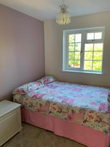 Katil atau katil-katil dalam bilik di Silverstone - 5 Bed - Sleeps 10