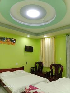 TV a/nebo společenská místnost v ubytování HoTel MoTeL ĐỒNG KHỞI