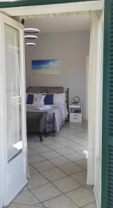 A bed or beds in a room at CAPERCIA home