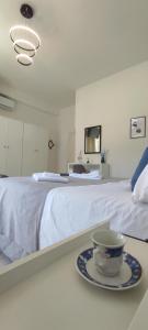 A bed or beds in a room at CAPERCIA home