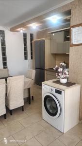 A kitchen or kitchenette at Fáraó vendégház