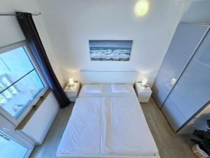Ein Bett oder Betten in einem Zimmer der Unterkunft Apartment Villa Bralo