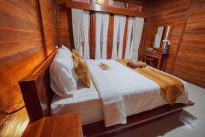 Postel nebo postele na pokoji v ubytování Double'D Hostel