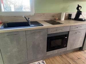 Kuchyň nebo kuchyňský kout v ubytování Chez Mymy