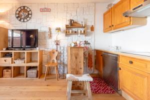 Kuchyň nebo kuchyňský kout v ubytování Panorama 2000, 4pers, Local à Ski, Confort + 18 fotografií