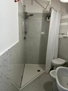 Koupelna v ubytování Palazzo Palloni Boutique Apartment + 19 fotografií