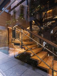 a set of wooden stairs in a building at Elysia Boutique Hotel in Chania Town