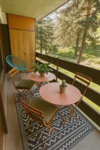 Balkón nebo terasa v ubytování Studio alpin & central Ovronnaz avec parking