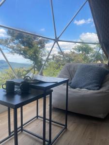 Istumisnurk majutusasutuses Aura - Glamping Experience