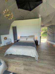 Voodi või voodid majutusasutuse Aura - Glamping Experience toas