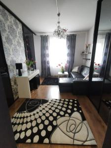Ένα ή περισσότερα κρεβάτια σε δωμάτιο στο Blackapartment