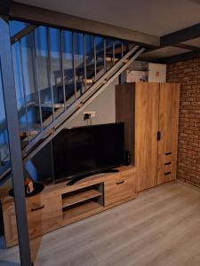 Televisyen dan/atau pusat hiburan di Apartman Duga