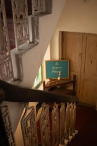 Зображення з фотогалереї помешкання The Turquoise Letterbox - Twin at Central у місті Колката