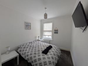 Ένα ή περισσότερα κρεβάτια σε δωμάτιο στο Josh's place near Paignton beach +29 φωτογραφίες