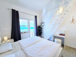 Ein Bett oder Betten in einem Zimmer der Unterkunft Apartment Villa Bralo