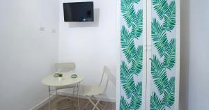 TV a/nebo společenská místnost v ubytování Le Pigne - Mare e Relax