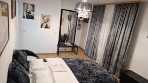 Ένα ή περισσότερα κρεβάτια σε δωμάτιο στο Vila vio