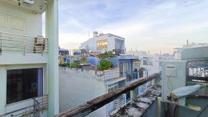 a view of a city from the balcony of a building at Studio luxury District 10 - A paradise of food, shopping and beauty take care services in Ho Chi Minh City