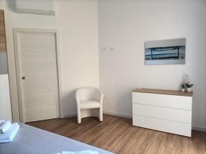 Rúm í herbergi á Passi Alterni Apartments