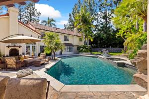 a swimming pool in the backyard of a house at #Marbella Lane - Tranquil Country Escape Getaway in Placentia