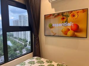 TV/trung tâm giải trí tại Vinhomes Grand Park Homestay-Riverside House