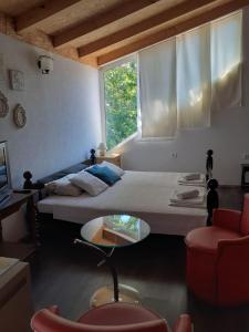 Postel nebo postele na pokoji v ubytování Borov Apartment