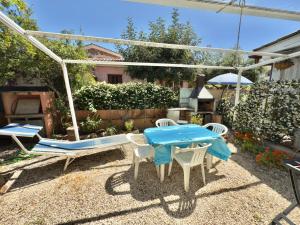 A garden outside Appartamenti San Teodoro