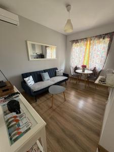 Et opholdsområde på Apartman Anastazija + 18 billeder