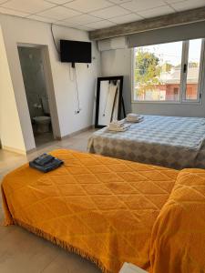 Ένα ή περισσότερα κρεβάτια σε δωμάτιο στο Apart Rocamora