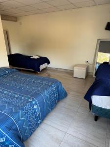 Ένα ή περισσότερα κρεβάτια σε δωμάτιο στο Apart Rocamora +11 φωτογραφίες