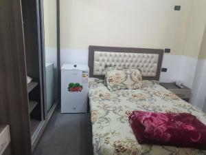 Postel nebo postele na pokoji v ubytování Alfares Hotel