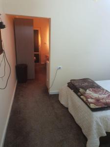Postel nebo postele na pokoji v ubytování Alfares Hotel