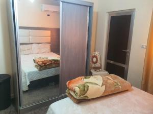 Postel nebo postele na pokoji v ubytování Alfares Hotel
