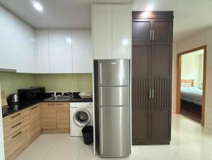 Η κουζίνα ή μικρή κουζίνα στο The Condo C - Luxury Condo with Onsen