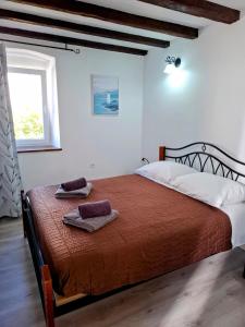 Posteľ alebo postele v izbe v ubytovaní Holiday Home Don
